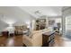 Open-concept living room with high ceilings and sliding doors to the patio at 14634 Village Park East Dr, Carmel, IN 46033
