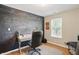 Home office features a chalk board wall and a large desk at 14634 Village Park East Dr, Carmel, IN 46033