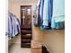 Organized walk-in closet featuring custom shelving and drawers, maximizing storage and convenience at 14707 Thor Run Dr, Fishers, IN 46040