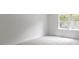 Bright bedroom with a large window letting in natural light at 16 Maplecrest Dr, Carmel, IN 46033