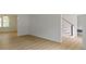 Bright living room area showcasing hardwood floors and open layout at 16 Maplecrest Dr, Carmel, IN 46033