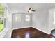 Comfortable bedroom with hardwood floors, natural light and neutral paint at 1610 S F St, Elwood, IN 46036