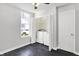 Well-lit laundry area with appliances and views of the outdoors at 1610 S F St, Elwood, IN 46036