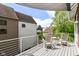 Covered outdoor balcony with rocking chairs and overhead shade at 1630 N New Jersey St, Indianapolis, IN 46202