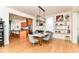 Bright dining room with open view to kitchen and modern decor, complete with stylish table setting at 1630 N New Jersey St, Indianapolis, IN 46202