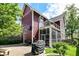 Exterior elevation of the house featuring the patio, balcony, and outdoor barbecue area at 1630 N New Jersey St, Indianapolis, IN 46202