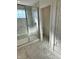 Modern bathroom with white marble tile, glass shower, and neutral color palette at 1679 W 171St St, Westfield, IN 46074