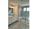Bathroom showcases a vanity, marble floors, and a glass enclosed shower at 1679 W 171St St, Westfield, IN 46074
