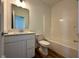 Bathroom features a tub and shower combo with a modern vanity and fixtures at 1679 W 171St St, Westfield, IN 46074