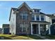 Two-story home featuring a blend of brick and siding, complemented by professionally landscaped surroundings at 1679 W 171St St, Westfield, IN 46074
