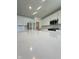 Close-up of white quartz kitchen island, stainless faucet and white subway tile backsplash at 1679 W 171St St, Westfield, IN 46074