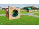 Community dog park featuring pet play structures and a grassy area for furry friends at 175 Rock Island Rd, Westfield, IN 46074