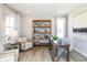 Home office with natural light, desk, and ample shelving for storage and display at 175 Rock Island Rd, Westfield, IN 46074