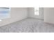 This bedroom features carpet flooring, natural light from two windows, and neutral walls at 18943 Seaforth Way, Westfield, IN 46074