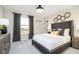 A modern and bright bedroom with gray walls and a cozy feel at 18943 Seaforth Way, Westfield, IN 46074
