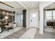 Inviting entryway with a white front door, pendant lighting, and stylish decor at 18943 Seaforth Way, Westfield, IN 46074