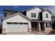 Charming new two-story home featuring white siding and a two-car garage at 18943 Seaforth Way, Westfield, IN 46074