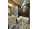Beautiful bathroom featuring a bathtub, modern tile flooring, and a shower head at 2009 Draper St, Indianapolis, IN 46203