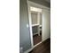 Walk-in closet with adjustable shelves and hanging rods for plenty of storage at 2009 Draper St, Indianapolis, IN 46203