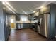 Modern kitchen featuring stainless steel appliances and ample counter space for cooking at 2009 Draper St, Indianapolis, IN 46203