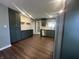 Well-appointed kitchen featuring granite countertops, stainless steel appliances, and custom cabinetry at 2009 Draper St, Indianapolis, IN 46203