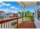 View from balcony of colorful neighboring homes and a blue, sunny sky at 2013 Yandes St, Indianapolis, IN 46202
