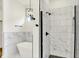 Elegant bathroom features a soaking tub and a glass enclosed shower at 2013 Yandes St, Indianapolis, IN 46202