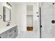 Modern bathroom features vanity, toilet, and glass enclosed shower at 2013 Yandes St, Indianapolis, IN 46202