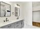 Modern bathroom featuring double sinks, and sleek black fixtures at 2013 Yandes St, Indianapolis, IN 46202