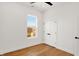 Well-lit bedroom features wood floors and a double door closet at 2013 Yandes St, Indianapolis, IN 46202