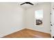 Bedroom with wood floors, a ceiling fan, and bright natural light at 2013 Yandes St, Indianapolis, IN 46202