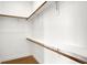 Walk-in closet with wood shelves, perfect for organizing your wardrobe at 2013 Yandes St, Indianapolis, IN 46202