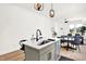 Bright kitchen with a breakfast bar, an open layout, and modern pendant lights at 2013 Yandes St, Indianapolis, IN 46202