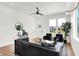 Bright living room with hardwood floors, modern furniture, and a minimalist design at 2013 Yandes St, Indianapolis, IN 46202