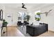 Cozy living room with hardwood floors, modern furniture, and lots of natural light at 2013 Yandes St, Indianapolis, IN 46202