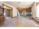 Open space with wood flooring, awaiting personalization and finishing touches at 207 S Center St, Plainfield, IN 46168