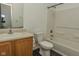 Well-lit bathroom featuring a vanity with sink, toilet, and a shower-tub combination at 2416 Foxtail Dr, Plainfield, IN 46168