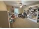 Functional craft room with great natural light, work stations, and built-in storage shelves at 2635 Red Admiral Ln, Lebanon, IN 46052