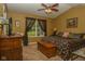 Comfortable bedroom with ceiling fan and view to the outdoors at 270 Rapid Rill Ln, Brownsburg, IN 46112