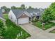 Charming single-Gathering home featuring a two-car garage, well-manicured lawn, and welcoming front porch at 270 Rapid Rill Ln, Brownsburg, IN 46112