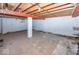 Spacious unfinished basement with exposed ceiling beams and concrete floor at 3510 E 34Th St, Indianapolis, IN 46218