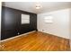 Bright bedroom featuring hardwood floors and plenty of natural light at 3510 E 34Th St, Indianapolis, IN 46218