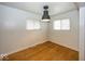 Bedroom featuring hardwood floors, neutral walls, and natural lighting at 3510 E 34Th St, Indianapolis, IN 46218