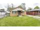 Charming brick home with well-maintained lawn and inviting curb appeal at 3510 E 34Th St, Indianapolis, IN 46218
