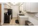 Traditional kitchen featuring white cabinets, stone backsplash, and stainless-steel appliances at 3510 E 34Th St, Indianapolis, IN 46218