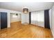 Hardwood floors, an open-concept design, and windows create a warm living area at 3510 E 34Th St, Indianapolis, IN 46218