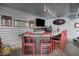 Garage featuring a bar with seating, ideal for entertaining friends and Gathering at 3682 S 380 E, Anderson, IN 46017