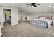 Spacious primary bedroom includes carpet, a ceiling fan, and a closet at 3682 S 380 E, Anderson, IN 46017
