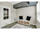 Charming mud room featuring storage bench, natural lighting, and decor rug at 3682 S 380 E, Anderson, IN 46017