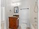 Bathroom featuring wood vanity with granite counters, a tub, and a shower with neutral paint at 3705 Lima Ct, Indianapolis, IN 46227